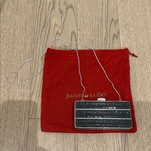 Judith Leiber Black and Silver Striped Clutch